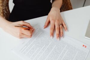 Woman reviewing filed divorce papers and planning her next steps